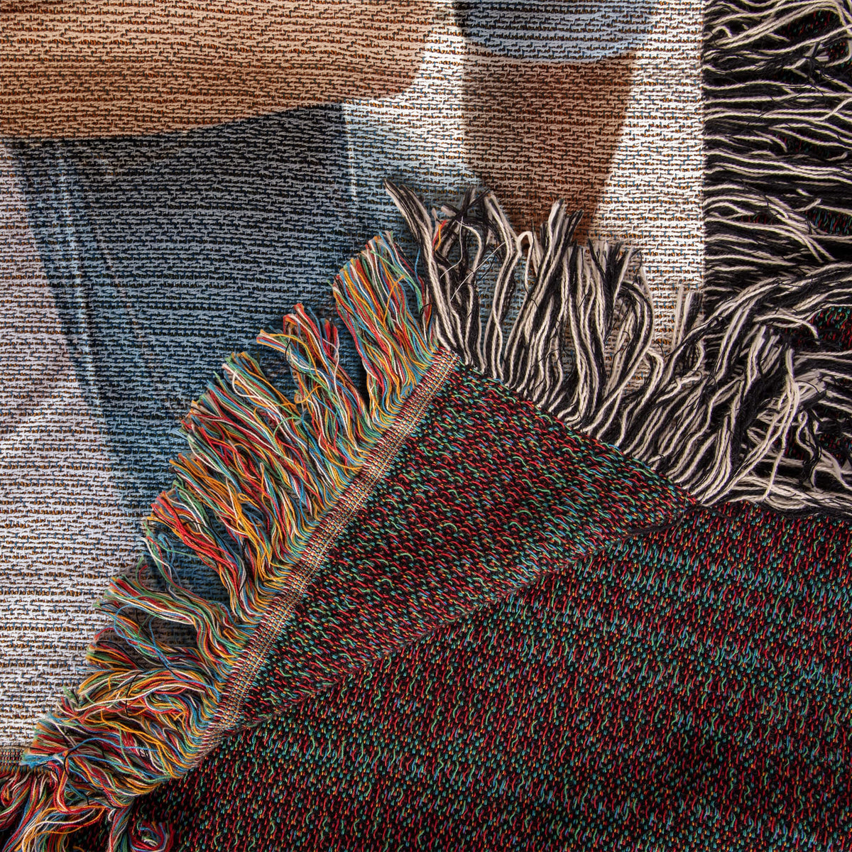 Folded corner showing the reversed woven back and fringe